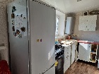 Азовский район, В с. З-Обрыв: дом 62 кв. м в центре, газ, вода в доме, сл. яма, скважина, уч. 28 сот., въезд кр. год, торг.  7